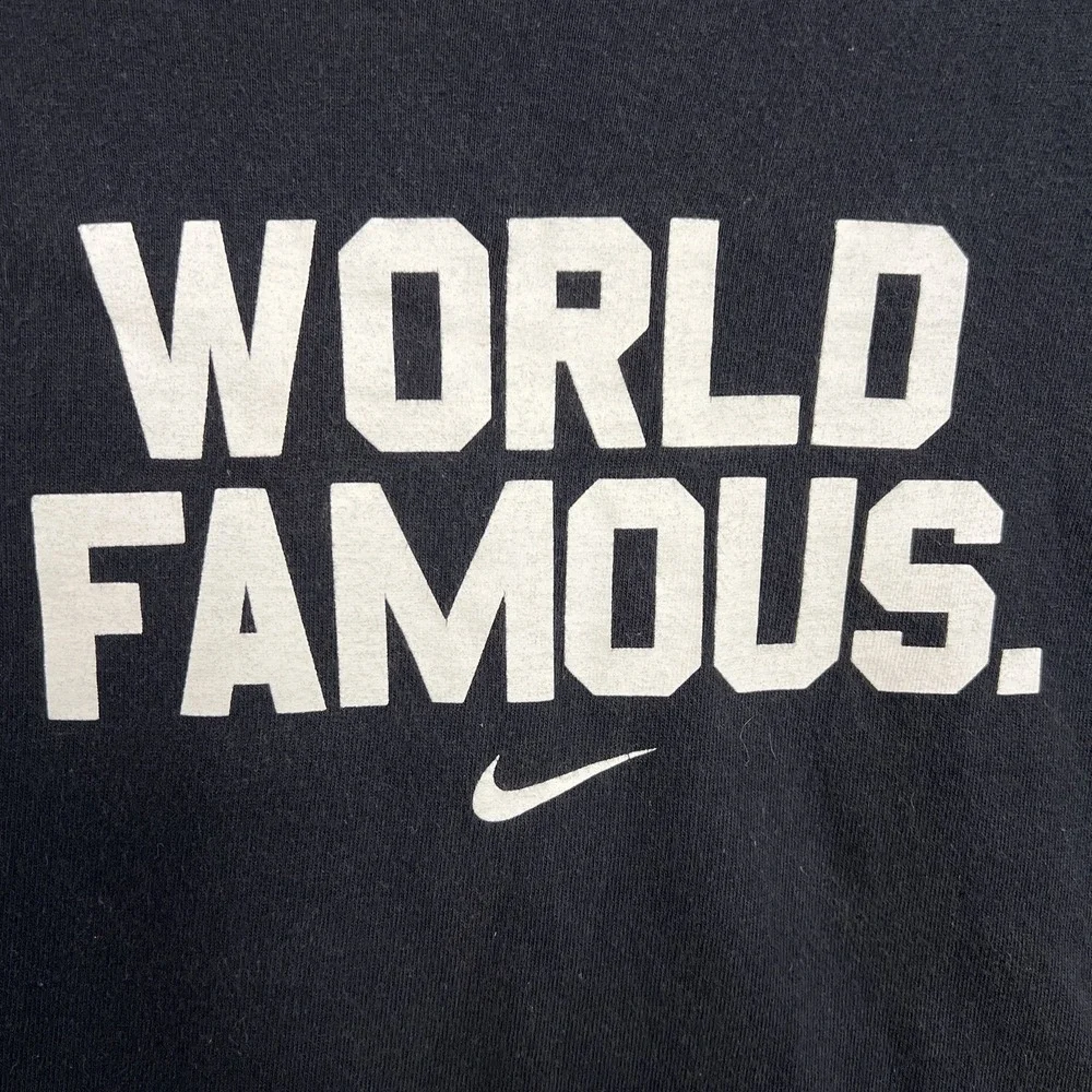 VTG Nike T Shirt Youth Size L Black Center Swoosh World Famous 2-Side Tee *Rare*